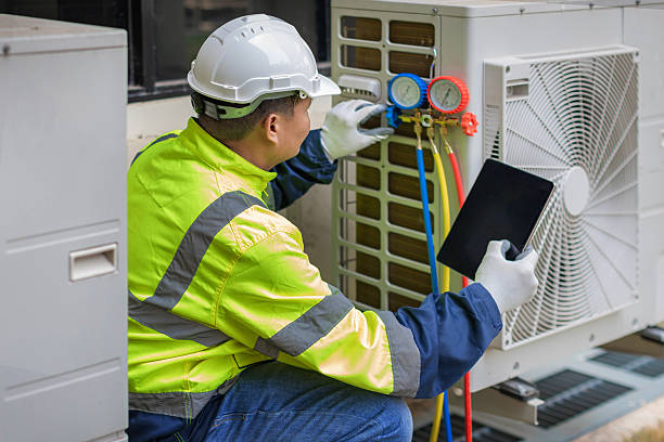 Professional Air Conditioning Repair technician working in Lakemore, OH